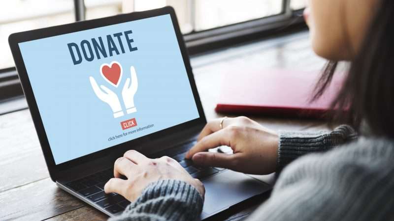 woman making an online donation